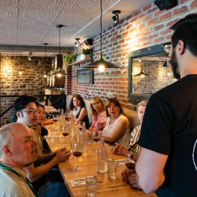 Server taking order during Evening Gourmet Food Tour in Quebec City, Canada. Sapristi Resto