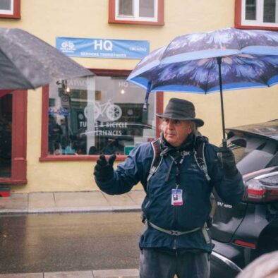 tour guide on rainy day