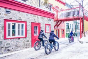 two fat bikes with tour guide in winter